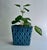 Mid Century Modern Geometric Quilted Pattern Ridged Rim Glazed Blue Ceramic Flower Pot. Featuring an upright rectangular...