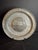 An exceptional 18th-century Continental pewter festival charger featuring an applied high-relief central medallion showing...