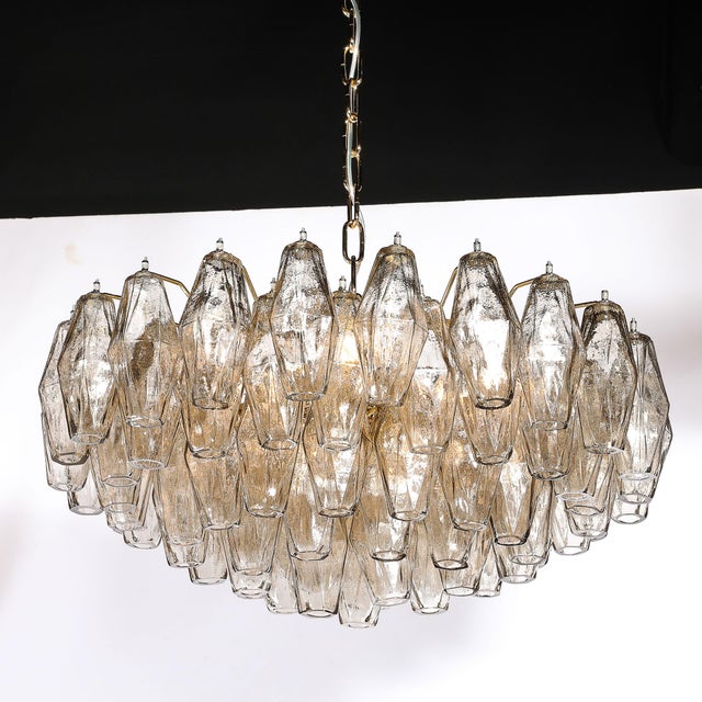 This modernist Murano chandelier features an exquisite array of hand-blown smoked glass polyhedra, suspended on an elegant...