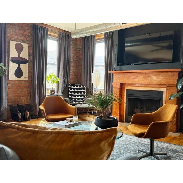 Pair of swivel chairs by Vecta Group in a Mid Century Modern Space Age design. Bucket style seats with integrated...