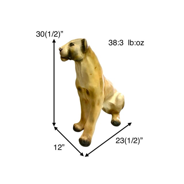 Stunning mixed-material life-size mountain lion sculpture. Dramatic Hollywood Regency statement. Condition: In good...