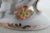 Orange Porcelain Cherub and Flower Figurine Candle Holder For Sale - Image 8 of 11