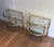 This beautiful pair of rounded side tables is made of brass and silver-plated brass with glass shelves. This is a French...