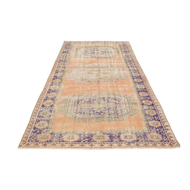 Handknotted vintage wool rug from Oushak region of Turkey. Approximatelly 50-60 years old. In very good condition.