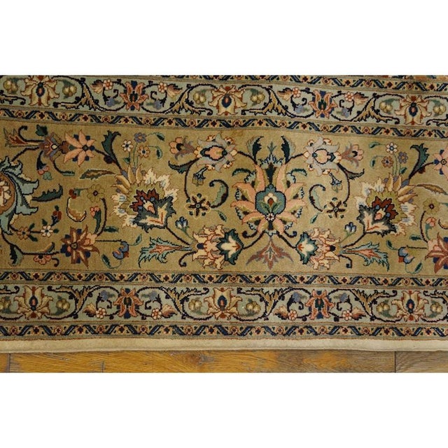 This is a beautiful, room-sized antique Tabriz rug, dating back to circa 1940. Measuring 9'1" x 12'3", this formal carpet...