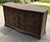 Coastal skirted wicker bow front dresser with seven drawers. Color is a rich chocolate brown with coordination wooden...