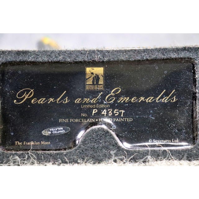 Signed and numbered. Limited edition Franklin Mint issued. Porcelain. Hand painted. Numbered P435T. Signed Erté on base....