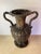 Substantial decorative urn in a Renaissance/Baroque Revival style, cast in bronze or brass with a rich, deeply oxidized...