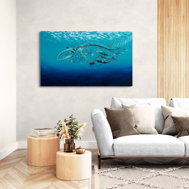 This artwork depicts a ghostly whale skeleton suspended in a vibrant underwater scene, surrounded by a lively array of...
