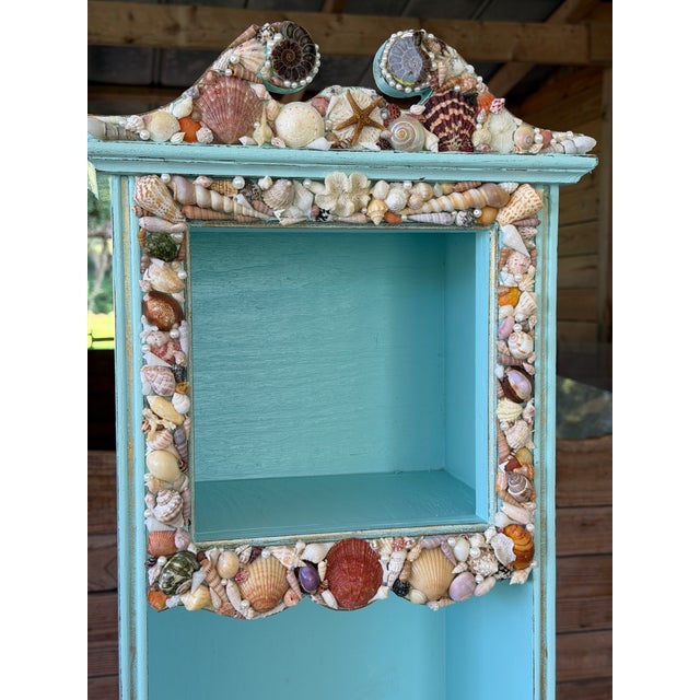 A delightful piece of Florida kitsch with endless coastal charm, this vintage grandfather clock has been thoughtfully...