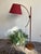 A floor lamp by Domus where natural character and organic design come together beautifully. Because of its cherry-red...