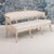 A beautiful 19th c. Swedish sofa bench from the Gustavian period, newly upholstered in linen fabric with nail head trim....
