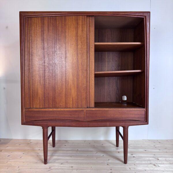 Vintage high sideboard by axel christiansen for aco møbler – denmark (1960) elevate the prestige of your furniture with...