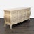 This Henredon dresser features a classic French Provincial design with elegant curved lines and ornate drawer handles. It...