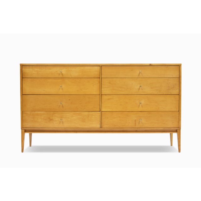 Here is an 8-drawer, solid maple dresser by Paul McCobb for Winchendon Furniture Co. The "Planner Group" collection by...