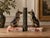 A striking pair of French Art Deco bookends featuring two beautifully modeled seated dogs, signed Jamar, circa 1930. Each...