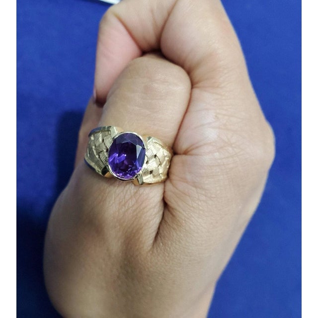 ♥ Product Summary ♥ Main Stone: Amethyst Band Material: 14k Yellow Gold Stone Cut: Oval Weight: 7 grams Width: 11mm