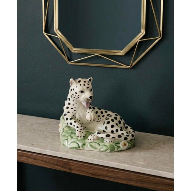 Bring a touch of whimsy to a collected interior with this vintage Jeanne Reed’s porcelain reclining leopard. Its hand-...