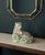 Bring a touch of whimsy to a collected interior with this vintage Jeanne Reed’s porcelain reclining leopard. Its hand-...