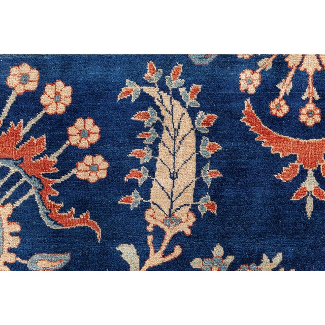 This Vintage 1920s Persian Kirman rug is a breathtaking example of classical Persian artistry at its finestboth regal and...