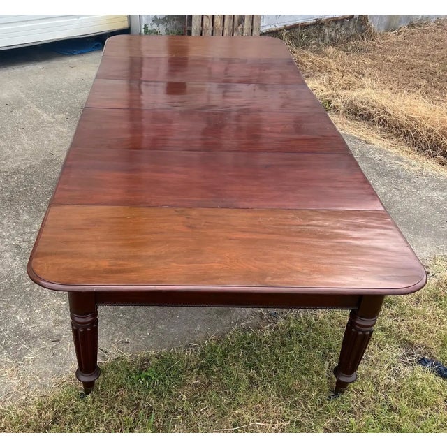 Impressive size and scale on this period 19th-century English mahogany dining table, likely made by Gillows in the 1st...