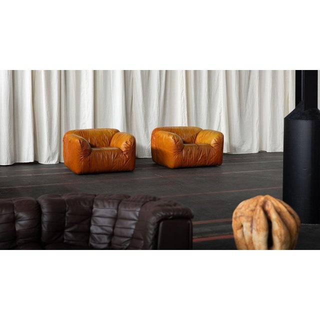 A cool and rare pair of bulky lounge chairs designed by Guido Rosati and manufactured by Uvet in Italy during the 1970s....