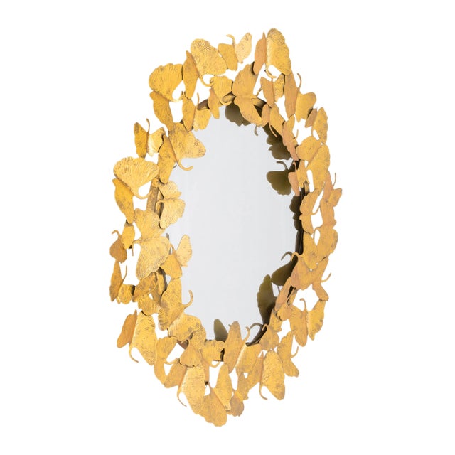 Framed by handcrafted butterflies, this whimsical mirror is more than just an accent piece. Each butterfly is hand...