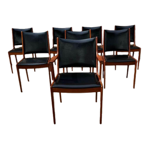Mid 20th Century Set of Eight Mid Century Black Vinyl Dining Chairs by Johannes Anderson U Uldum Mobelfabrik. 7171 Made in Denmark.