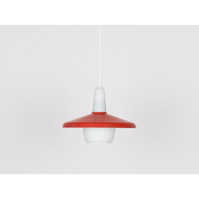 Aluminum and glass lamp from the 1950s. Designed by Bent Karlby. Dimensions: Diameter 20cm Height 20cm The lamp is in good...