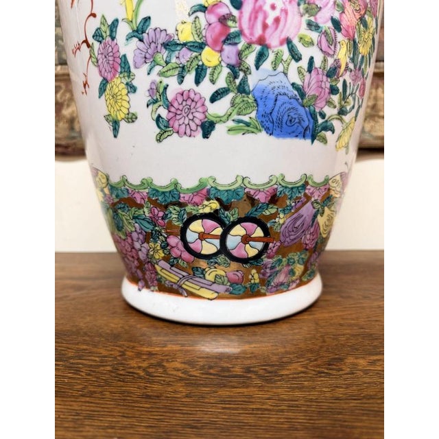 This large, vintage Famille Rose ceramic vase is an absolute masterclass in maximalist design, bringing an instant pop of...