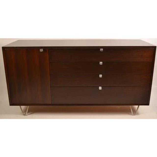 Nice George Nelson for Herman Miller dresser. Recently professionally restored to rich dark finish. One side has a cabinet...