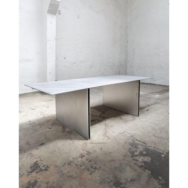 Dining Table in Hand Ground Aluminium by Case Studios. Dimensions: W 240 x D 100 x H 75 cm. Materials: Hand-ground...