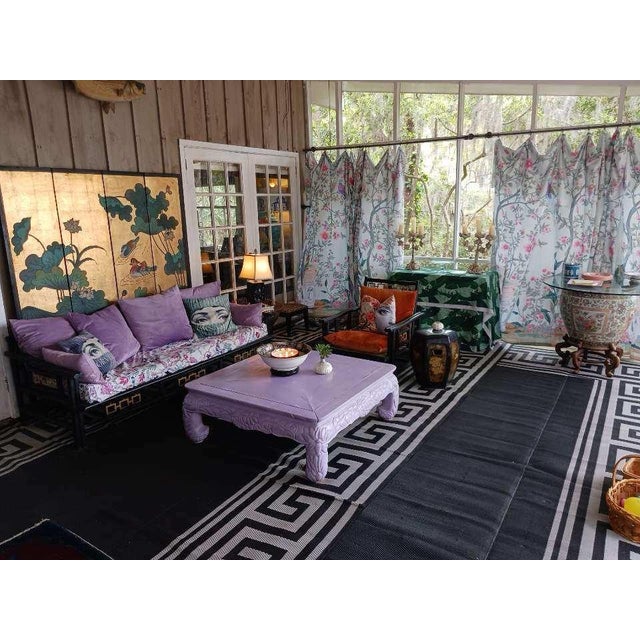 A striking and exceptionally uncommon 1950s Asian Modern sofa and lounge chair suite in the style of James Mont, featuring...