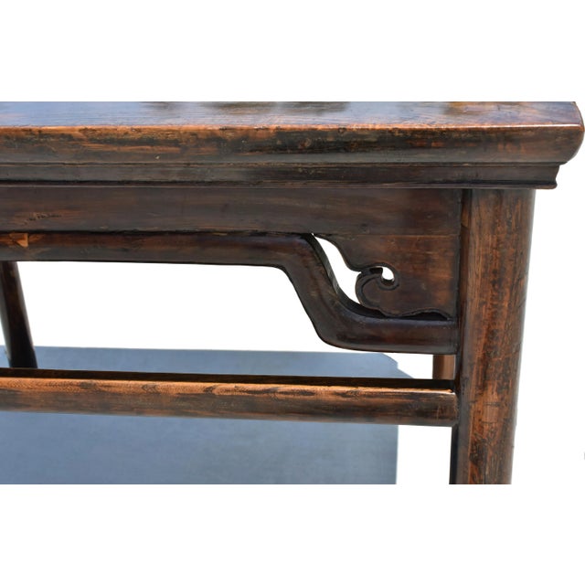 An extraordinary 19th century oversize Ming square table. The table top is constructed of four frame members and rests on...