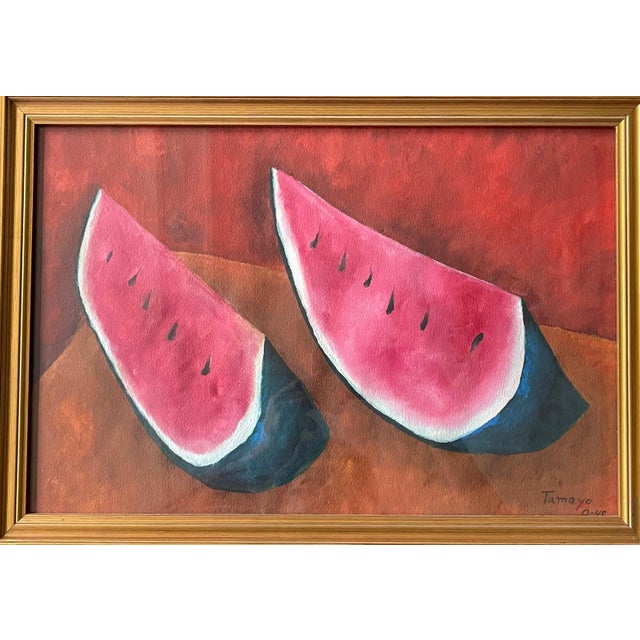 A framed watercolor and gouache on paper depicting sliced watermelon on a color block background, signed Tamayo and dated...
