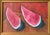 A framed watercolor and gouache on paper depicting sliced watermelon on a color block background, signed Tamayo and dated...