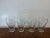 Set of 4 clear Coca-Cola contour-style drinking glasses with classic Coke logos. Great for everyday use, a home bar, or...