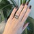 A 3.53ct lab grown diamond emerald cut ring set in solid 14K yellow gold, accented with two lab grown diamonds. Lab grown...