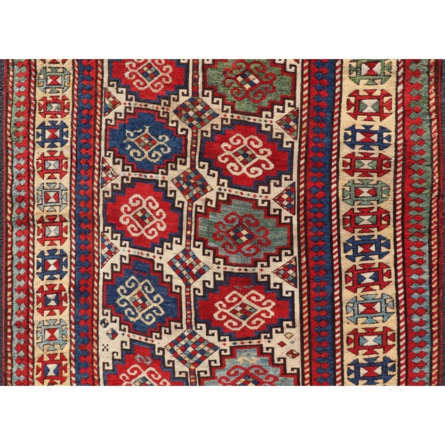 Tribal Antique Moghan Kazak Rug Showcasing Bold Geometric Medallions 4'6 X 6' For Sale - Image 3 of 11