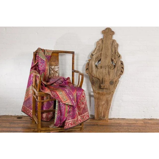 A large antique hand carved tribal 19th century sculpture from the Batak People, northern Sumatra, called a Singa Singa...