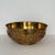 We are very pleased to offer a striking vintage brass bowl, circa the 1960. This piece features intricate cut-out designs...