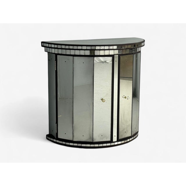 Hollywood Regency Style, Distressed Glass, Painted Wood, Mirrored Demilune Cabinet A single Hollywood Regency style...