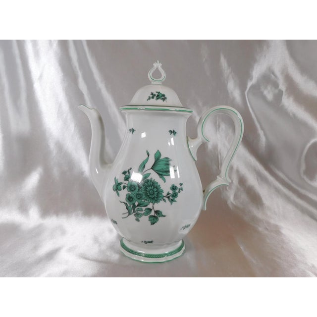 This is a large white Rosenthal Coffee Pot with Green trim and a green floral pattern in the Green Bloom pattern. It comes...
