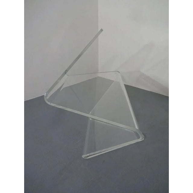 Heavy Acrylic Glass table or sculpture from the 1970s. Height on edge 87 cm. Height flat 47 cm. Width on edge 94 cm. Width...