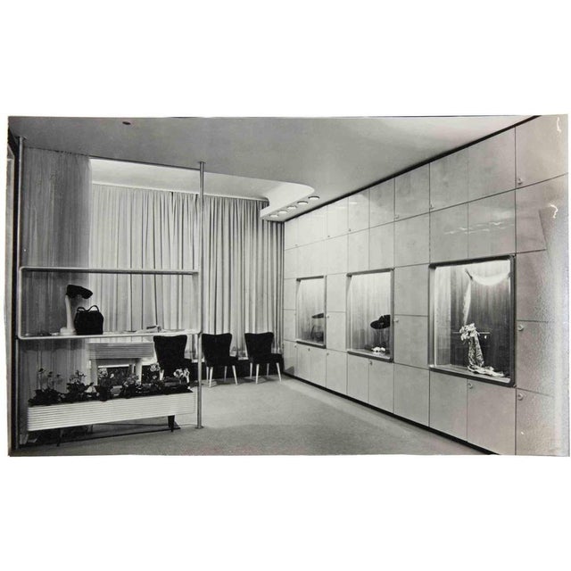 Vintage black and white photograph showing the interior of a fashion salon, most probably the NK Department Store...