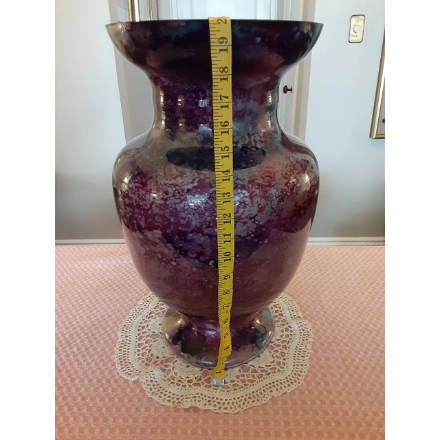 Beautifully colored and shaped Glass Vase that stands 20” high. This is a signature piece that would stand out in a...