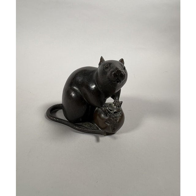Rat with a Chestnut Okimono - Bronze - Japan - Meiji Period (1868–1912) 19th century. Depicts a rat holding a pomegranate...