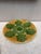 Colorful French Majolica green and yellow oyster plate with stylized leaves, circa 1890.