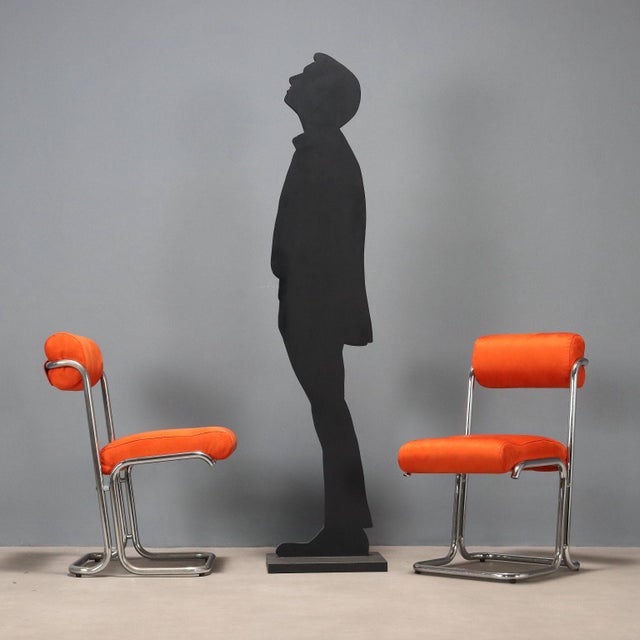 Set of 4 chairs, chromed metal, foam padding, suede-effect fabric upholstery. The padding, fabric, and chrome plating have...