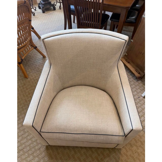 Elevate your living space with this sophisticated A. Rudin Model 712 swivel armchair, a masterclass in contemporary...